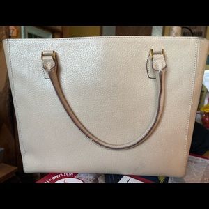 Super cute bone Kate Spade tote. Older tote but still in really good condition!